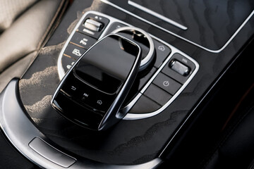 automatic transmission shift selector in the car interior. Closeup a manual shift of modern car...