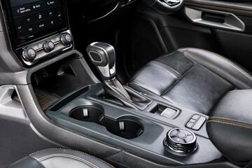 automatic transmission shift selector in the car interior. Closeup a manual shift of modern car...
