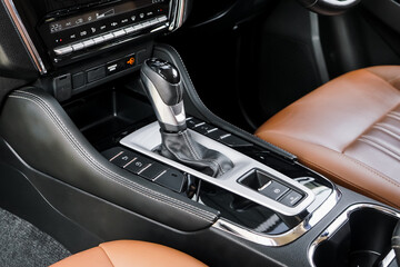 automatic transmission shift selector in the car interior. Closeup a manual shift of modern car...