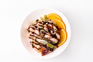 a salad of their fruits, apples, pears and oranges. on a white background