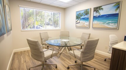 Modern meeting room with glass table, stylish chairs, and beach-themed artwork in background