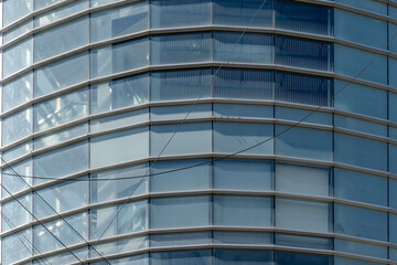A collection of various exterior windows on buildings, showcasing diverse architectural styles and materials.