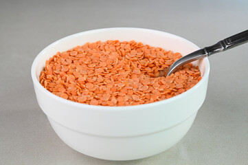 Closeup view of masoor dal in a bowl. Also called as red lentil.