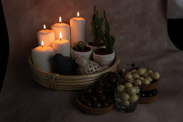 chocolate and caramel, round and delicious dessert standing in front of candlelight