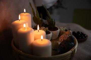 chocolate and caramel, round and delicious dessert standing in front of candlelight