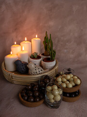 chocolate and caramel, round and delicious dessert standing in front of candlelight