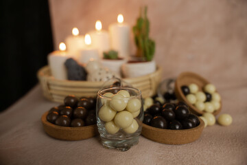 chocolate and caramel, round and delicious dessert standing in front of candlelight