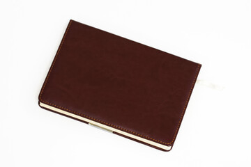 brown leather weekly on a white background