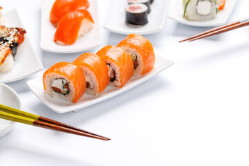 Assorted sushi and maki rolls beautifully arranged on plates