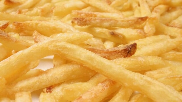 Camera sliding movement over French fries.