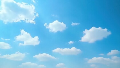 Fototapeta premium Beautiful White Clouds Floating in a Bright Blue Sky on a Sunny Day