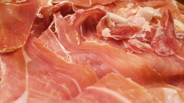 Jamon Iberico Tapas: A Close-Up of the Finest Spanish Ham, Chef&rsquo;s Special, with a sliding motion.