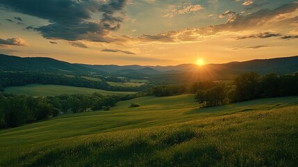 Obraz premium Sunset glowing over a lush green valley with rolling hills