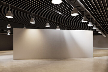 Blank exhibition stand in modern gallery space with concrete floor and ceiling lights. 3D Rendering