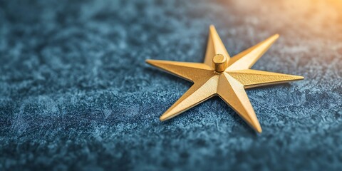 A shiny, golden star on a textured blue background, symbolizing achievement and excellence.