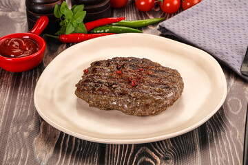 Grilled beef burger cutlet with sauce
