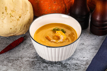 Pumpkin cream soup with prawns