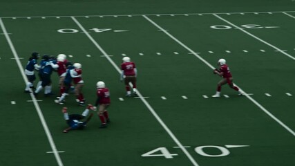 American Football Players Face Each Other On the Field. Game Starts and an Athlete Making a Quick Pass that is Caught By an Opponent, Runner Begins to Advance and Scores Points. Team Celebrate