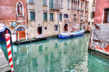 Blue Venice Canal Boat and Red Pole