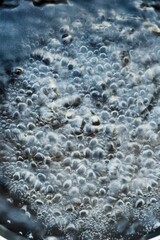 Close-Up of Boiling Water with Rising Bubbles