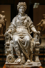greek godess Cybele t Greek and Phrygian mother goddess, symbolizing fertility, nature, and wild animals, often depicted with a crown, lions, and a chariot in mythology.