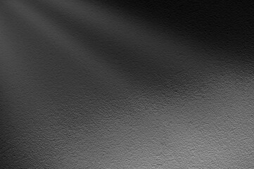 Light rays on dark grey background. Abstract grey light background.