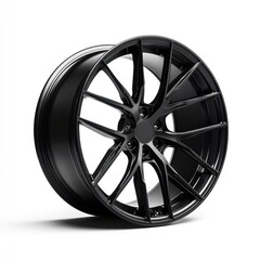 Obraz premium Black alloy wheel isolated on white. Auto part