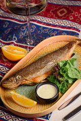grilled trout with herbs and lemon sauce
