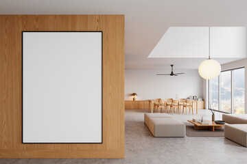 Modern interior with blank framed poster on wooden wall in bright minimalist living space. 3D Rendering
