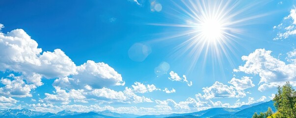 Bright sun shining over clear blue sky.