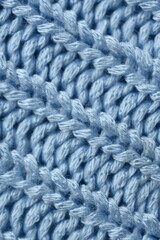 blue texture of crocheted, Macro texture of cotton light blue crocheted sweater as background, close-up of pastel blue crocheted front, blue crocheted back, texture of wool wool, blue crocheted front
