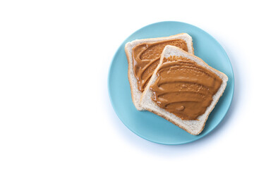 Bread toast with peanut butter cream isolated on white background. Top view. Copy space