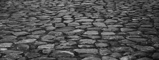stone pavement in perspective. Old square cobble stone. paving perspective background. historical...