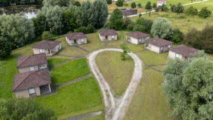 Aerial View of Circular Village with Identical Houses