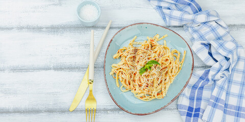Plant based pasta with tomato sauce, herbs and cheese. Ready to eat healthy vegan food