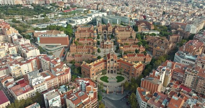 Aerial of Hospital de la Santa Creu i Sant Pau Barcelona Barcelona. Architecture of historical buildings in the cityscape of Spain. High quality 4k footage
