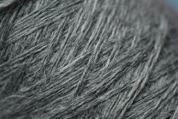 gray wool yarn texture. Soft natural fiber background for eco fashion, textile branding, crafts, or interior design. Perfect for handmade, organic, and sustainable lifestyle visuals.