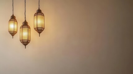 Three Elegant Moroccan Lanterns Hanging Against a Beige Wall Background