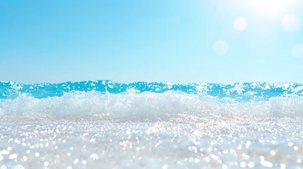 Sparkling beach waves on a bright sunny day