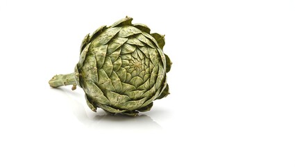 Obraz premium Vibrant artichoke with subtly spread leaves isolated on a clean white backdrop Perfect for food blogs and kitchen decor