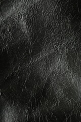 black leather texture close-up, seams on leather jacket as background, black natural leather as background, black leather stitching