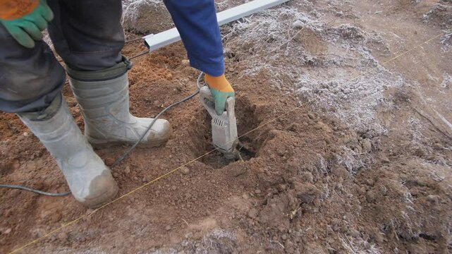 Demonstrating specialized ground drilling equipment that is crucial for construction projects and soil assessments