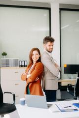 Portrait of success business people working together in modern office.