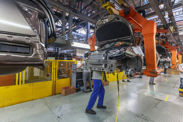 Fototapeta premium Conveyor assembly line of a passenger car.