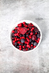Frozen red fruits still life isolated