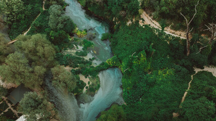 Aerial rising over Blue eye spring a natural phenomenon in Albania
