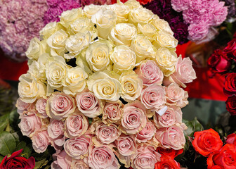 Large bouquet of roses close-up white, yellow, red