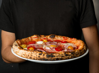 serving pizza at the restaurant