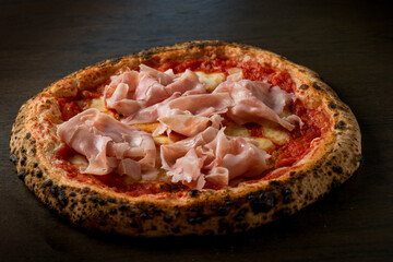 Ham pizza with tomato, mozzarella and ham