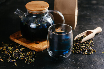 Tibetan Anchan tea on a dark background close-up. Blue tea